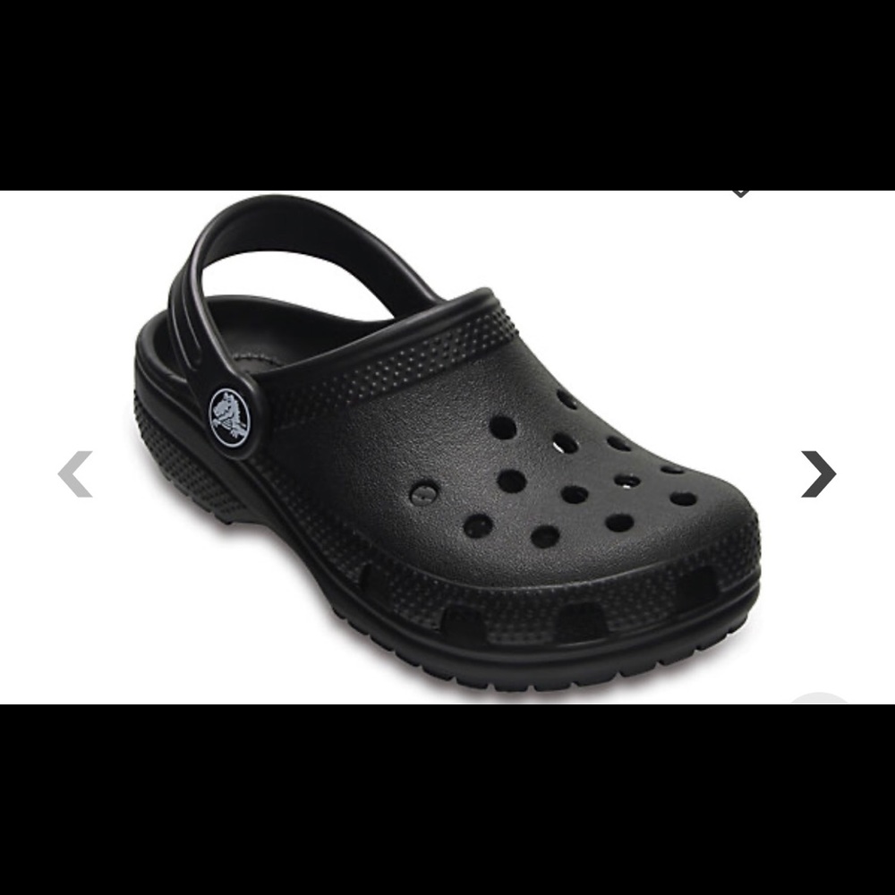 Woman’s black crocs